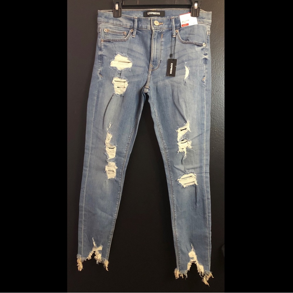 NWT Express Women's Light Blue Ripped Skinny Mid Rise Stretchy Jeans 8